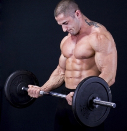 Man with a bar weights in hands training